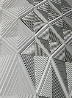 Modern Building Architecture Stampe: Geometric white patterns and cladding on wall of a modern building