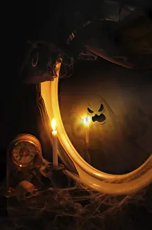 Abandoned Table Setting Stampe: Ghost reflection in the mirror on the table with a candle