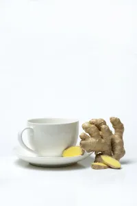 Root Vegetable Images Stampe: Ginger root with cup, ginger tea