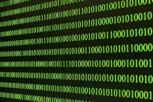 Green Binary Code Stampe: Green binary code arranged in rows on a black background