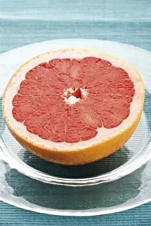 Close Up Citrus Fruit Stampe: Half of a red grapefruit, Ruby Star