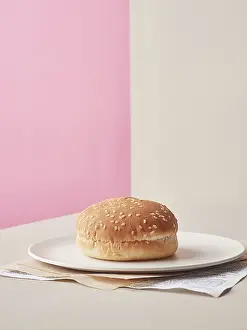 Deserted Table Setting Food Stampe: Hamburger bread alone with nothing in it