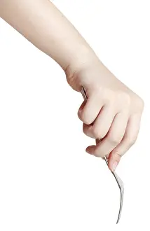 Nutrition Concept Stampe: Hand with fork against white background