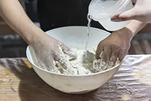 Meal Preparation Techniques Stampe: Detail of hands preparing dough for baking bread