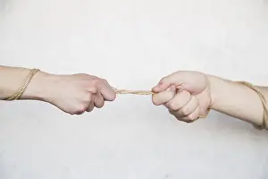 Teamwork Concept Stampe: Hands pulling rope