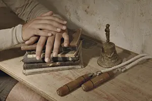 Educational Institution Image Stampe: Hands on stack of books, historic school setting