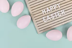 Christian Holiday Tradition Stampe: Happy Easter text on letter board with Easter eggs