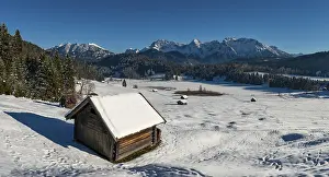 Upper Bavaria Winter Scene Stampe: Haystack in snow-covered landscape