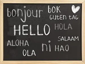 International Communication Stampe: Hello in different languages on chalkboard background