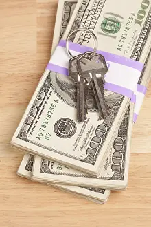 Cash For Keys Program Stampe: House keys on stack of money, cash for keys program