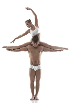 Studio Posing Stampe: Image of attractive acrobats posing in studio