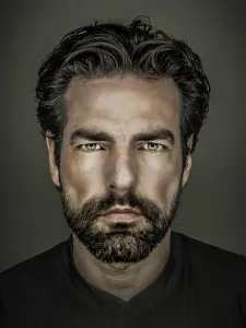 Self Confident Male Stampe: An image of a handsome man with a beard