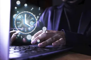 Online Business Professional Stampe: Image of a man using the computer with a clock indicating the time of use of the pc