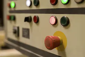 Industrial Building Interior Stampe: Image of red switch on remote control panel