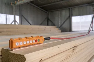 Timber Industry Equipment Stampe: Image of remote control for crane loading timber
