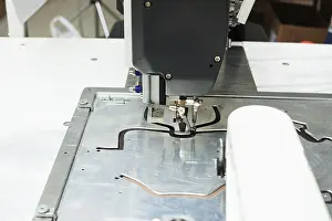 Handicraft Industry Equipment Stampe: Image of sewing machine stitching on patterns
