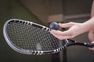 Tennis Equipment Stampe: Image of a woman's hand with a squash racket
