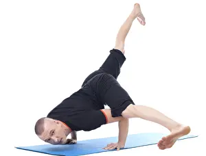 Gymnastics Training Photos Stampe: Image of yogi posing in studio looking at camera