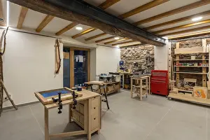 Modern Workspace Design Stampe: Interior space of a screen printing studio with different tables to work
