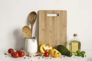 Food Photography Background Stampe: Kitchenware, vegetables and spices on table wall background