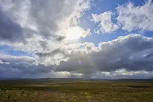Dramatic Scottish Landscape Stampe: Landscape under dramatic sky with sunbeams and cloud formations