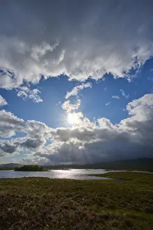 Deserted Waterfront UK Stampe: Landscape with river under blue sky and dramatic clouds
