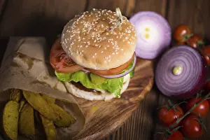 High Calorie Food Options Stampe: Large appetizing burger with beef