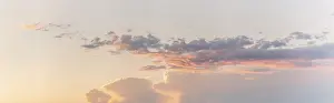 Sunset In Western Europe Stampe: Large pink cloud at sunset in spring