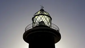 Barren Spanish Landscape Stampe: Lighthouse, backlight, close, upper part