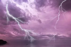 Dark And Gloomy Sky Stampe: Lightning over the sea with a dramatic sky