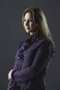 Plus Size Model Stampe: Low key portrait of size plus model in blouse posing in studio