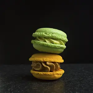 Foodstuff Photography Stampe: Two macarons on a black background