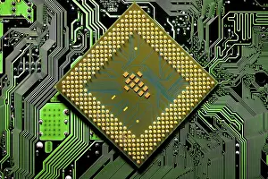 Electronic Communication Network Stampe: Macro Close up of microchips and pins on Main CPU PC processor circuit board