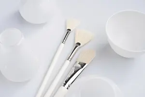 Professional Makeup Tools Stampe: Make up brushes of different size and type object high angle shot on white surface