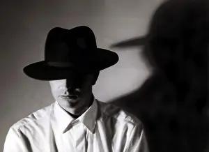 Fashionable Man Stampe: Man with hat and his shadow