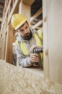 Construction Industry Jobs Stampe: Man working carpentry