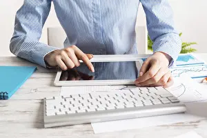 Business Accounting Stampe: Manager using tablet computer with blank screen