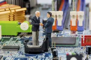 Printed Circuit Board Image Stampe: Two managers on computer board