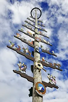 Bavarian Maypole Stampe: Maypole with guild sign in front of cloud sky