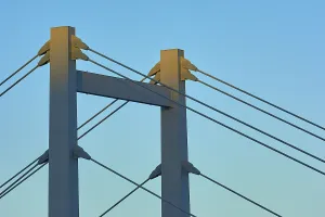 Atmospheric Evening Light Shot Stampe: A modern bridge at sunset with clear cable structures and a cloudless sky