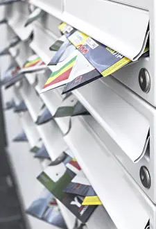 Shallow Depth Of Field Stampe: Modern mailboxes filled of leaflets