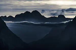 UNESCO World Heritage Site Dolomites Stampe: Mountain top of the Dolomites with dramatic cloudy sky