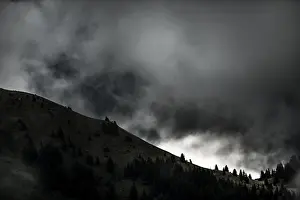 Overcast Sky Scenery Stampe: Mountain ridge with dramatic clouds