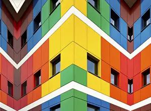 Educational System In Europe Stampe: Multi-colored facades of the school with black window frames