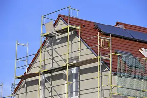 Residential Building Shell Stampe: New building with completed basic rendering of the exterior facade New building with completed basic rendering of