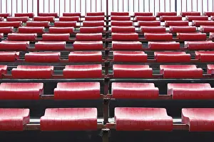 Deserted Stadium Stampe: Empty and numbered seats in a stadium
