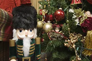 Festive Season Decoration Ideas Stampe: Nutcracker and christmas decorations around the tree