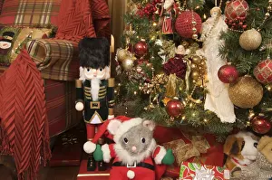 Decorative Items For The Festive Season Stampe: Nutcracker and christmas decorations around the tree