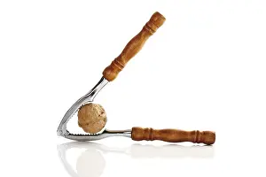 Studio Shot Of Nuts Stampe: Nutcracker with walnut