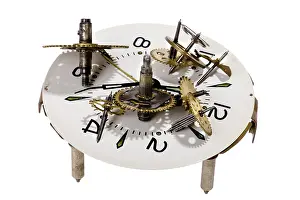 Studio Shot Of A Clock Stampe: Object on white - tool clockwork close up
